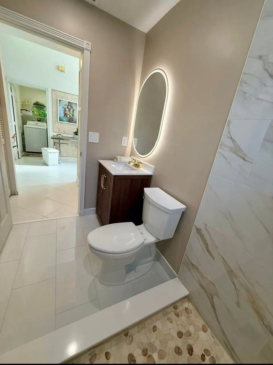 New bathroom vanity, toilet and LED mirror installation — Fenelon Handyman Services, Tampa Bay, FL