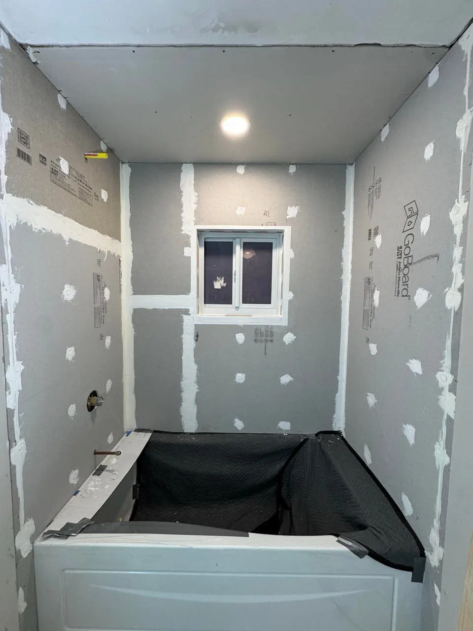 Wall board hung, fastened and mudded during a bathroom renovation — Fenelon Handyman Services, Tampa Bay, FL