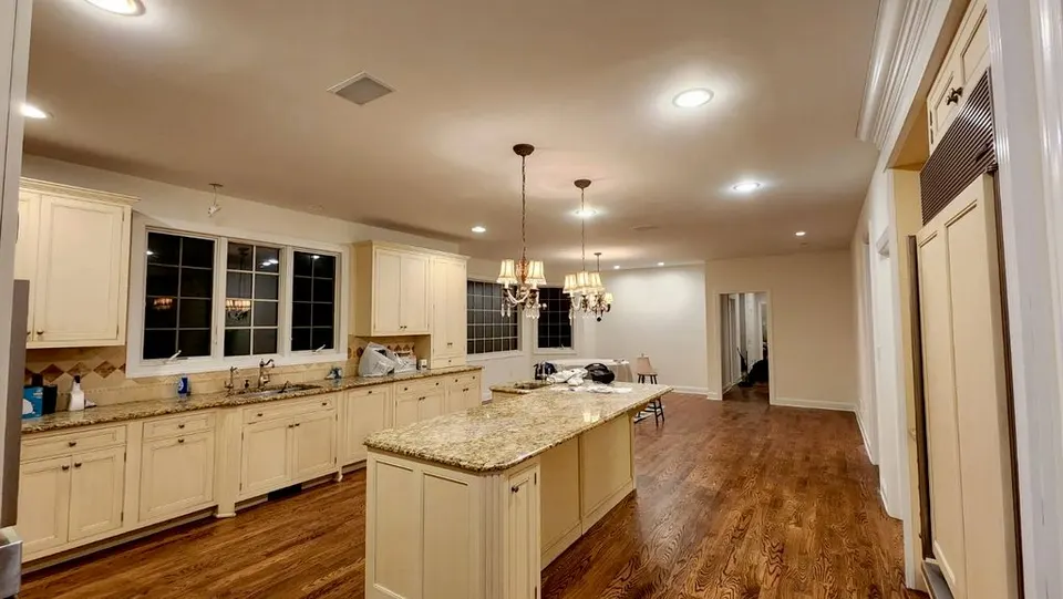 Pendant and recessed lighting installed over a kitchen island — Fenelon Handyman Services, Tampa Bay, FL