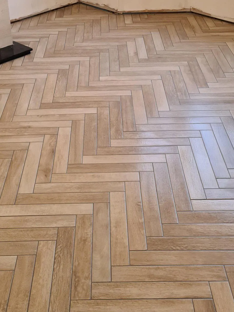 Herringbone wood floor installation, finished field — Fenelon Handyman Services, Tampa Bay, FL