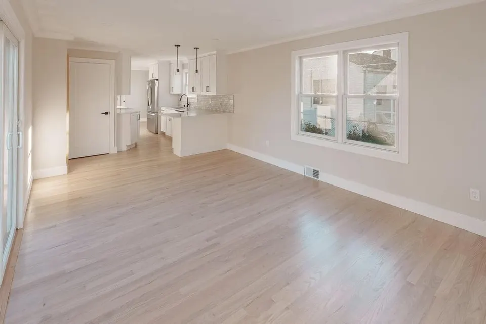 Light luxury vinyl plank flooring installed through an open living area — Fenelon Handyman Services, Tampa Bay, FL
