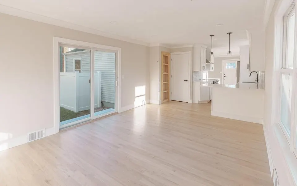 Open-plan living and kitchen after a full interior remodel — Fenelon Handyman Services, Tampa Bay, FL